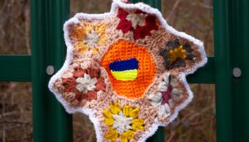 knitted decoration on fence