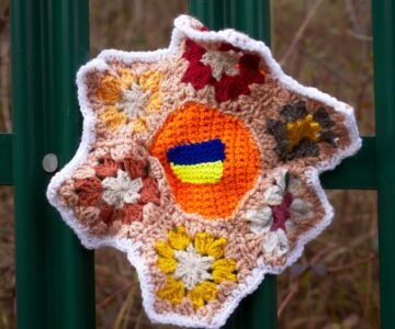knitted decoration on fence