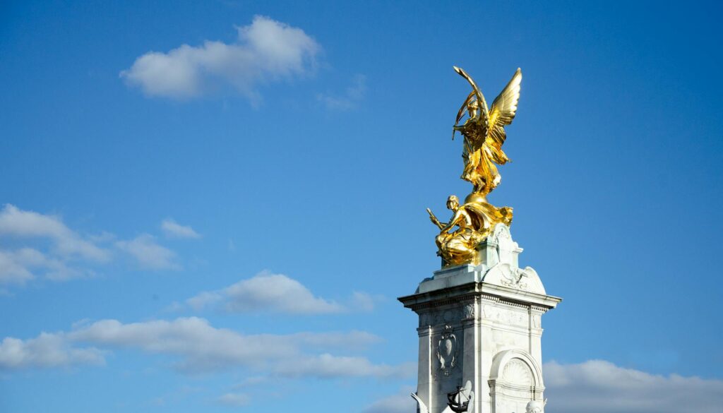 victoria memorial statue in london against blue sky