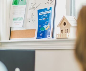 mortgage loans written on a white board posted flyers